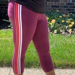 maroon leggings with stripes on the side